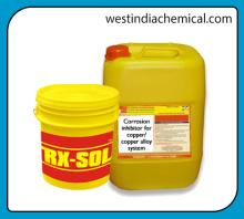 Corrosion inhibitor for copper/copper alloy system